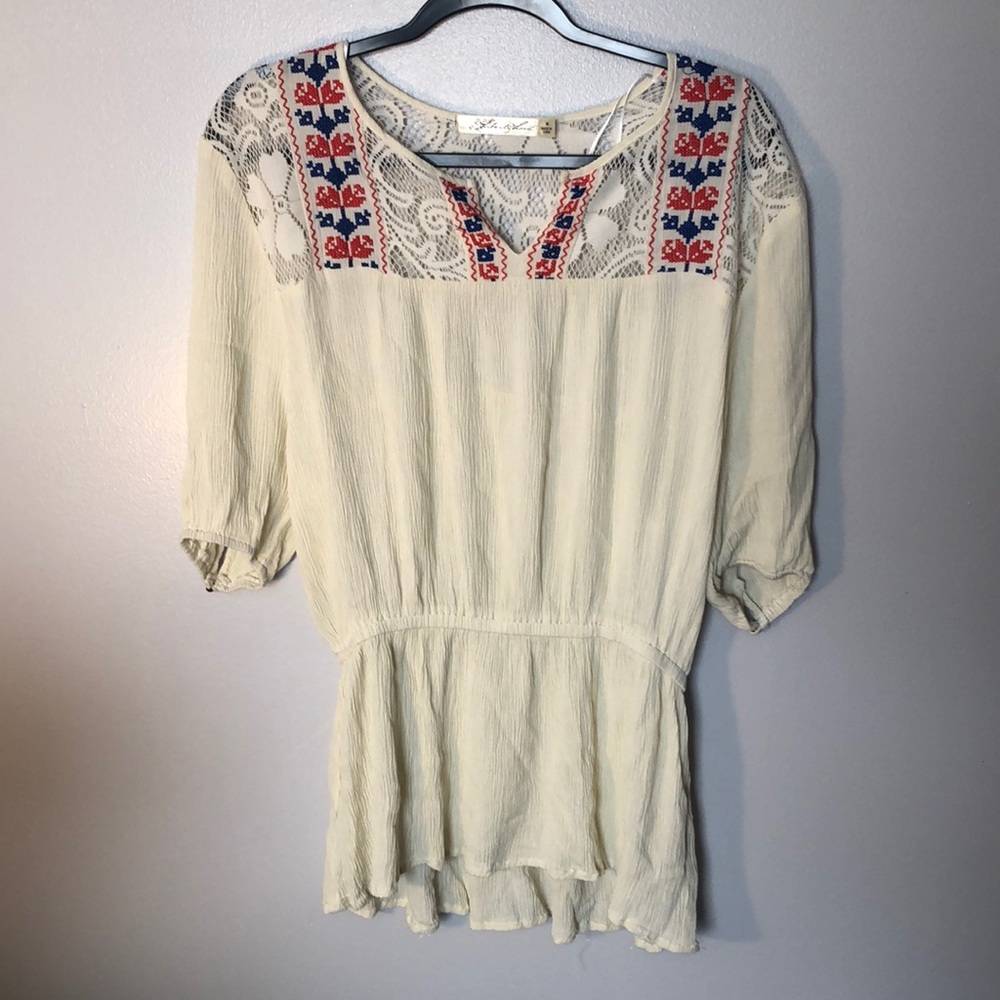 Cream blouse with cinched waist, lace collar